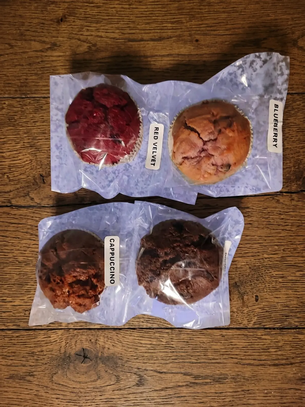 Individually wrapped Flo’s blueberry, red velvet, cappuccino and chocolate muffins